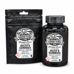 Black packaging and a dark glass bottle labeled Good Vibe THC Delta 9 Gummies, Pineapple Punch flavor; pouch (4 pieces) beside a 30-piece bottle.